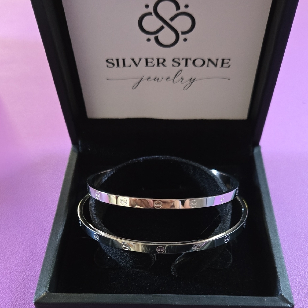 Platinum Plated Stainless Steel His/Hers Eternity Bangle Set.